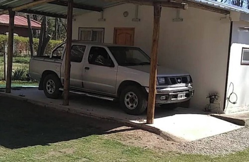 Guaymallen Cabin | Campos de Dios Cabin between streams and mountains
