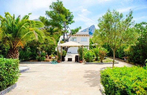 Urbanizacion Mont Ferrutx Villa | CAN JOAN-Chalet with large terrace with views and large garden, ideal for children. ETV/2154