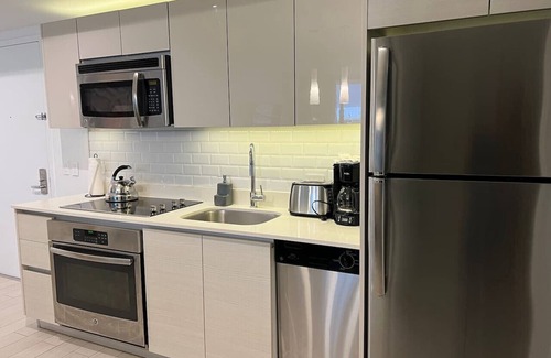 Hallandale Beach Apartment | Canal Pool Views, Premium Beach Service, Kitchen and 1B/1B