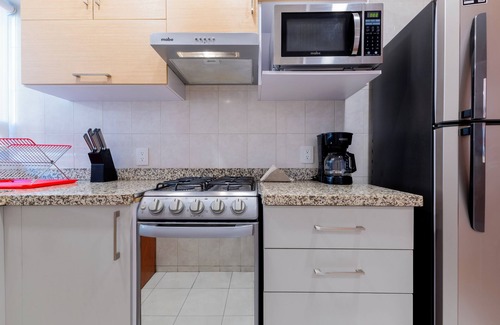 Anahuac Condo | Capitalia - Great for Home Office