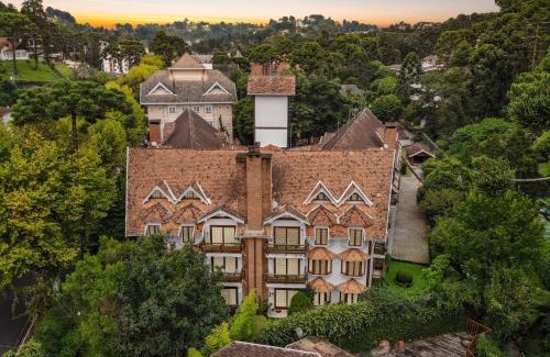 Campos do Jordao Apartment | Capivari England Classic Duplex Fireplace