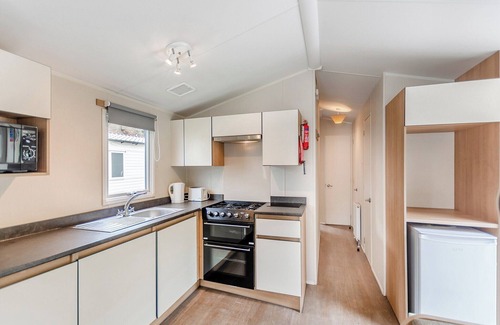 Longridge House | Caravan with one double and two twin.