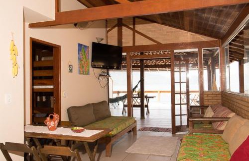 Trindade House | Casa 1 - Você a Varanda e o Mar na Praia dos Ranchos-Trindade Hospeda