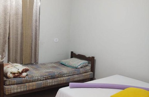 Ilha Comprida House | Casa amarela cantinho de lazer