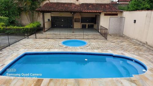 Palmeiras Apartment | Casa com 2 piscinas e ar condicionado