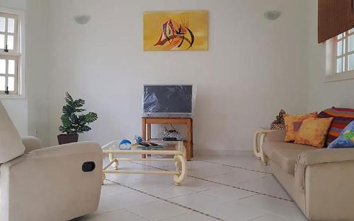 Centro House | Casa com churrasqueira no Centro de Caraguatatuba