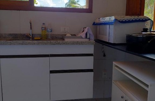 Pereque House | Casa com piscina aquecida em condomínio fechado