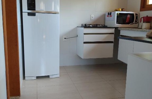 Pereque House | Casa com piscina aquecida em condomínio fechado