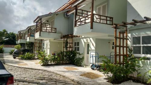 Camburi House | Casa com piscina e churrasq na Praia de Camburí