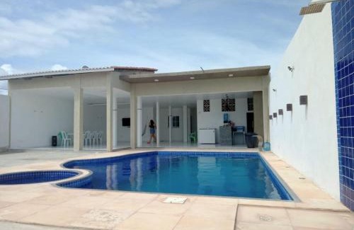 Aracati House | Casa com Piscina, hidromassagem e churrasqueira.