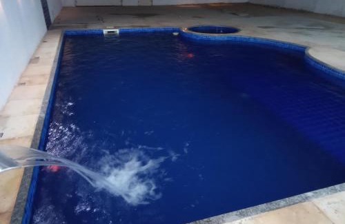 Aracati House | Casa com Piscina, hidromassagem e churrasqueira.