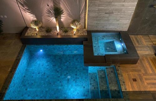 Muriae House | Casa com Piscina no bairro João VI, Muriaé-MG