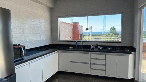 Jardim Capricornio House | Casa com spa em Caraguatatuba