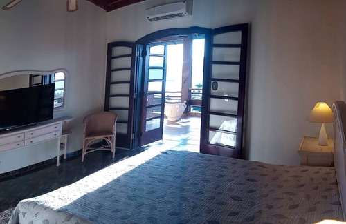 Itaquanduba House | Casa com vista privilegiada do mar em Ilhabela/SP