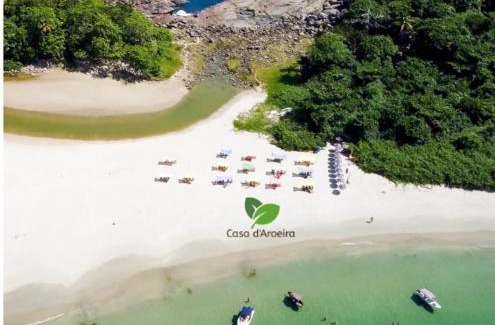 Juquehy House | Casa d'Aroeira Residencial Boutique - Centro de Juqueí - 2 quadras do mar - Serviço de Praia - Roupa de Cama 600 fios algodão Egípcio - Toalhas Banho e Praia - Tudo Novo - Estacionamento Interno - Cozinha - Consulte unidades com Ofurô Hidro e Cromoterapia