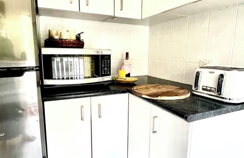 Newport Apartment | Casa de Piña, 700 mts to Newport Beach, headland views, spacious 2 bedrm apt.