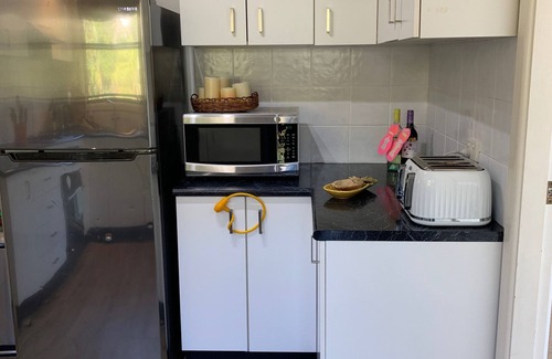 Newport Apartment | Casa de Piña, 700 mts to Newport Beach, headland views, spacious 2 bedrm apt.