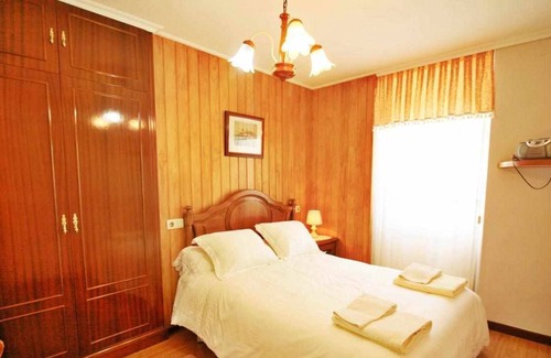 Zas House | Casa do Relojero