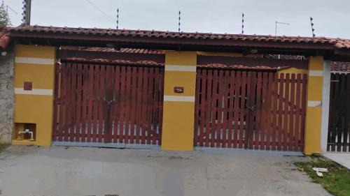 Jardim Britania House | Casa em Caraguá, uma quadra da praia com ar