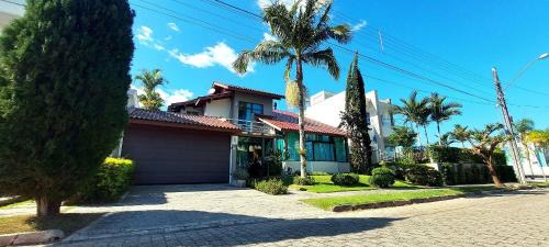 Jurere House | Casa Estrela Rubi em Jurerê Internacional