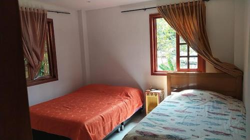 Raquira House | Casa hospedaje la quebradita