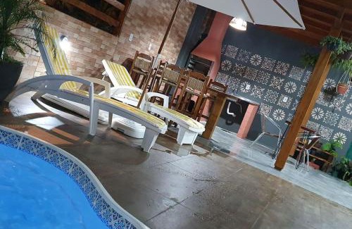 Ponta do Papagaio House | Casa na Praia do Sonho com Piscina e Jardim.