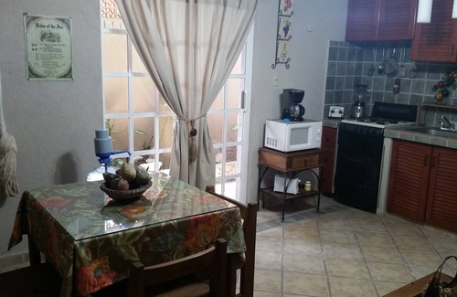 Colonos Cuzamil House | CASA OKLAHOMA in Cozumel Mexico is beautiful, private oasis 3 blocks from Ocean.