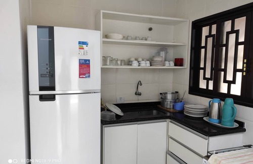 Jardim Neptunia House | Casa Pé na Areia .