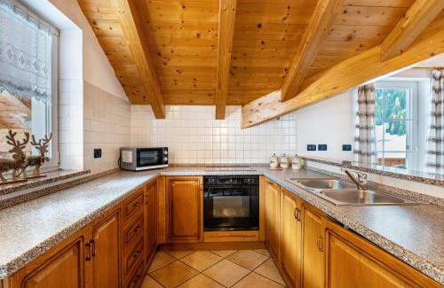 San Giovanni di Fassa Apartment | Casa Titol Giuseppe