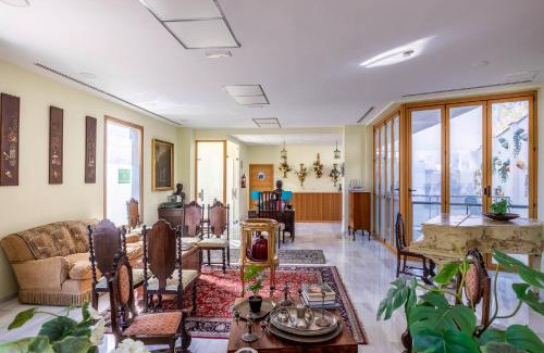 Carmona Villa | Casa Xanadu Carmona - Stylish villa with rooftop terrace and stunning views of Parador