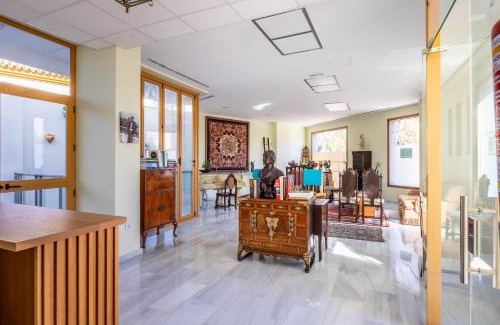 Carmona Villa | Casa Xanadu Carmona - Stylish villa with rooftop terrace and stunning views of Parador