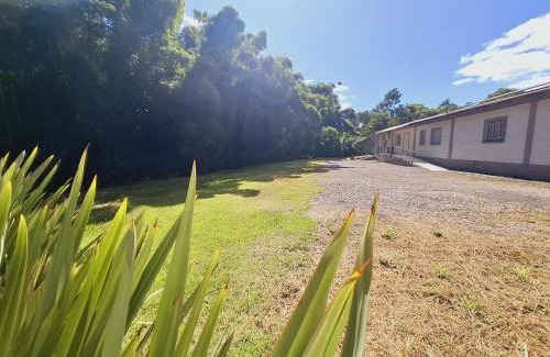 Mucum House | Casarão na rota do Cristo Protetor