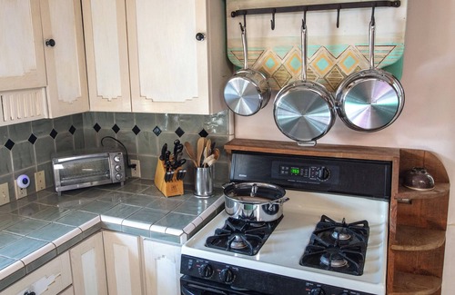 Valdez House | Casita de Colores secluded 2 story adobe amidst serene pine and ponderosa trees.