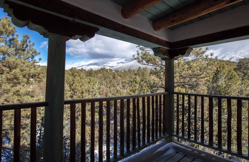 Valdez House | Casita de Colores secluded 2 story adobe amidst serene pine and ponderosa trees.