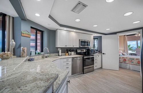 Sand Key Condo | CBC 1-3G – 5 Balconies with Gulf & Intercoastal Views, Pool, Hot Tub and more!