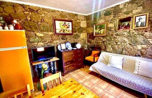 La Aldea de San Nicolas House | Centennial rural house completely preserved and renovated