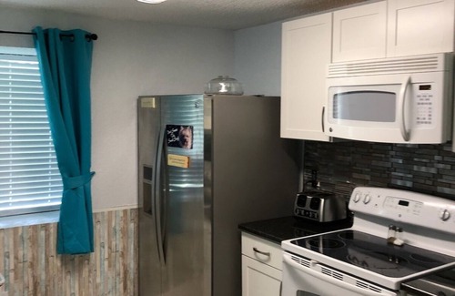 Oldsmar Villa | Centrally located to beaches, Close to Bush Gardens Pets Welcome Free Wifi