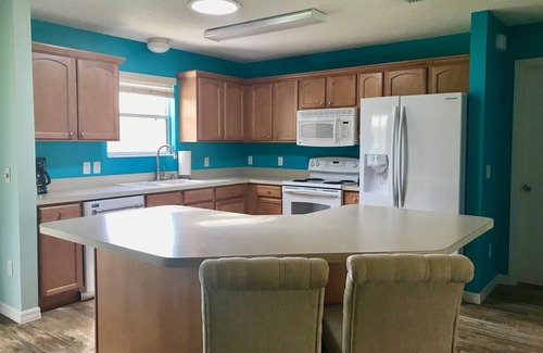 Duval House | Centrally Located Family Friendly - one gas golf cart, seats 4 - coastal themed