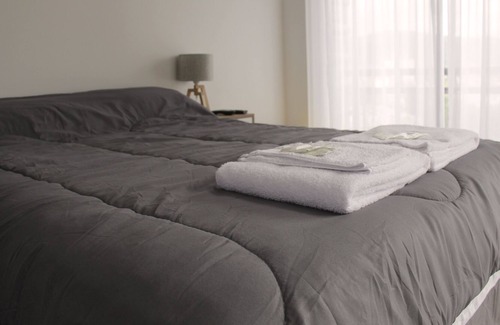 San Salvador de Jujuy Apartment | Cercano al centro de la ciudad pero en un barrio tranquilo, rodeado de árboles.