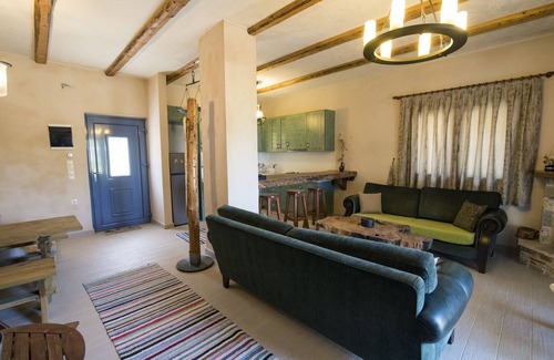 Kos House | Chaihoutes stone villa into Olive farm in Zia