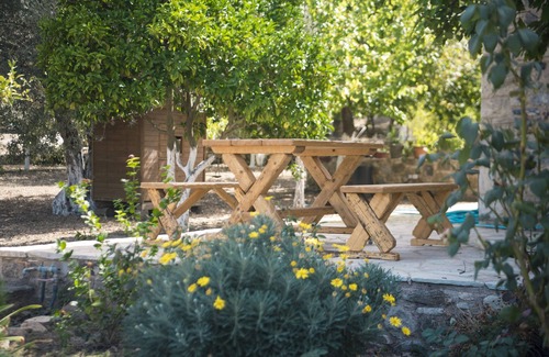 Kos House | Chaihoutes stone villa into Olive farm in Zia