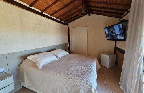 Carrancas Ski Chalet | Chalés Vila Real - Tranquilidade na Serra de Carrancas - Piscina com uma vista espetacular do Pôr do Sol