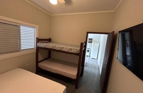 Enseada Ski Chalet | Chale com ar na praia da Enseada