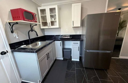 Dolphin's Cove House | Charming 1-bedroom townhome in Palm Valley with outdoor shower