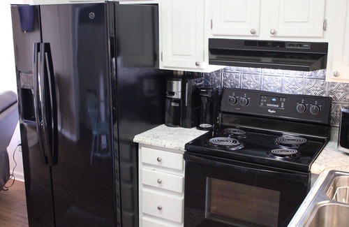 North Myrtle Beach Apartment | Charming 2-bedroom condo offering serene living with picturesque pond vistas, with a lovely pool!