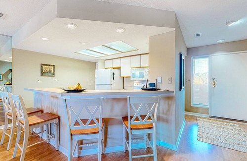 Shelter Cove Villa | Charming bay view villa with pool, washer/dryer, balcony, TV, & full kitchen