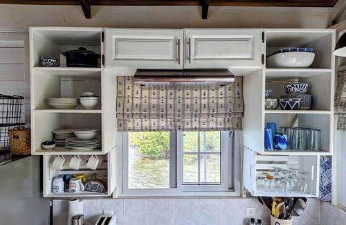 Big Bight Apartment | Charming bungalow over a coral reef in the Caribbean sea with stunning sunsets!