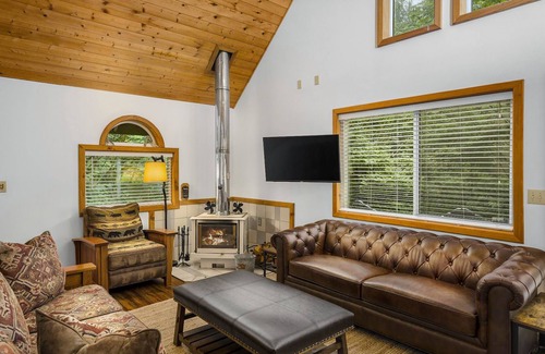 Skykomish House | Charming cabin with hot tub, firepit, wood stove, & W/D - near Stevens Pass