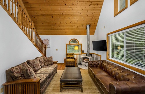 Skykomish House | Charming cabin with hot tub, firepit, wood stove, & W/D - near Stevens Pass