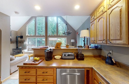 Beckwourth House | Charming cabin with private deck, fireplace, movie projector, & W/D